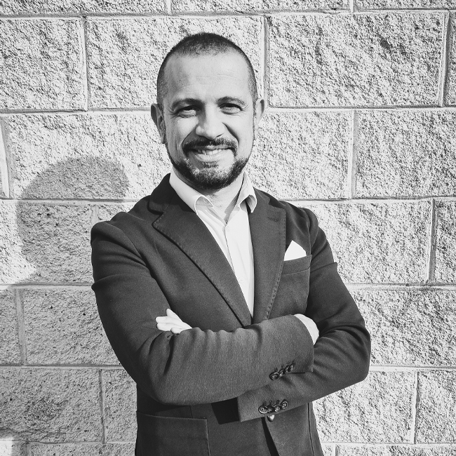 Portrait of Alfredo Parisi, Sales Manager at Magic SpA, featured on the Contact page.