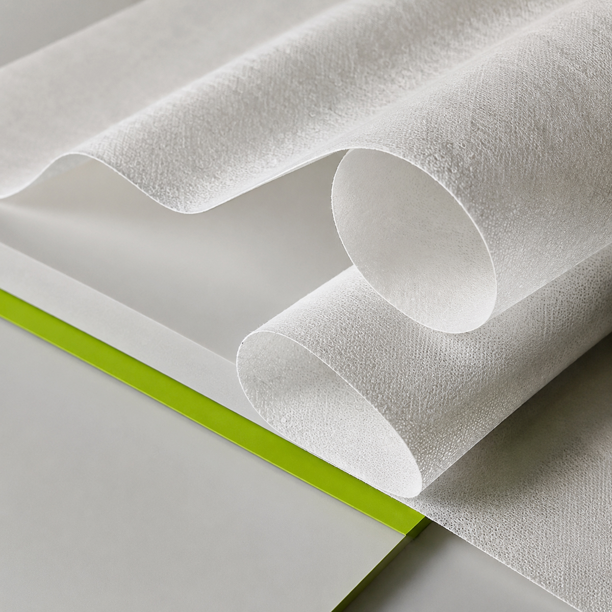 Airgel g-grade absorbent material with close-up of its textured structure